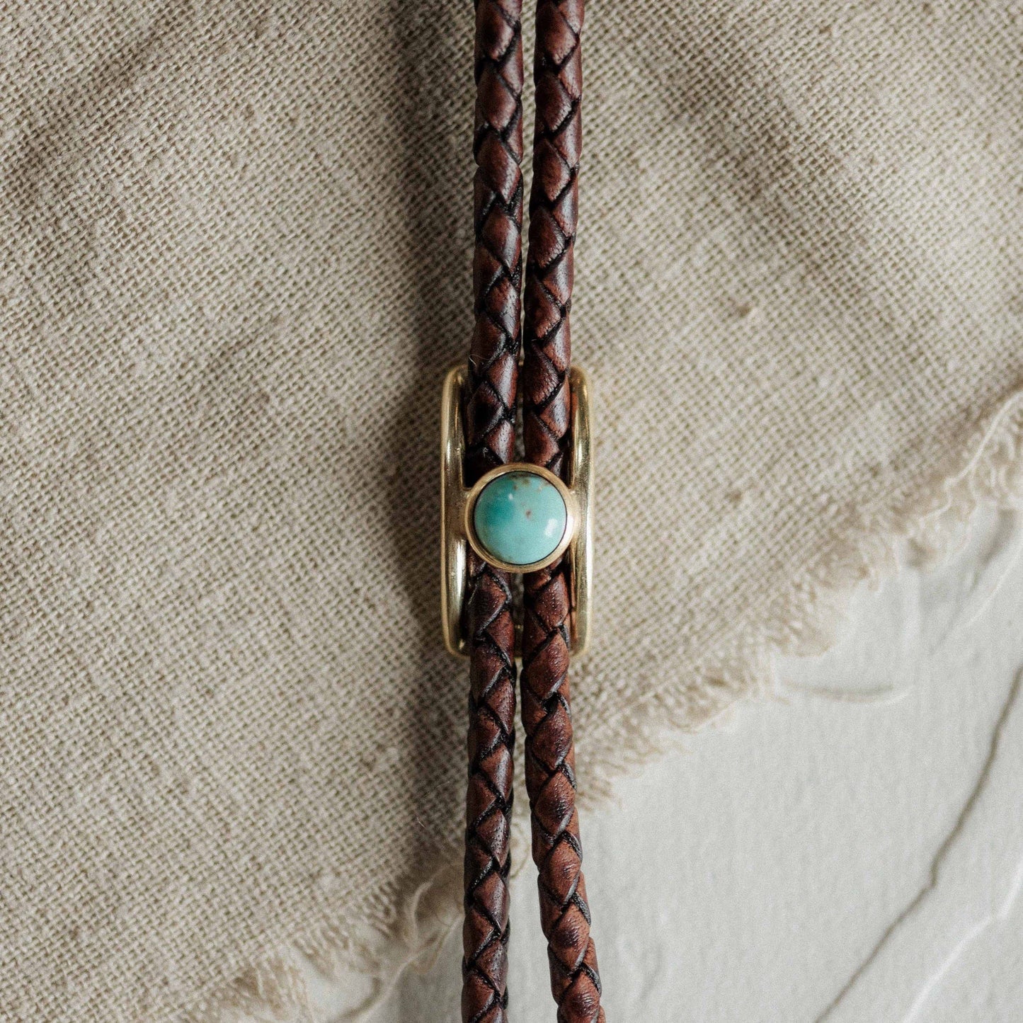 Turquoise Brass Buckle Bolo Tie